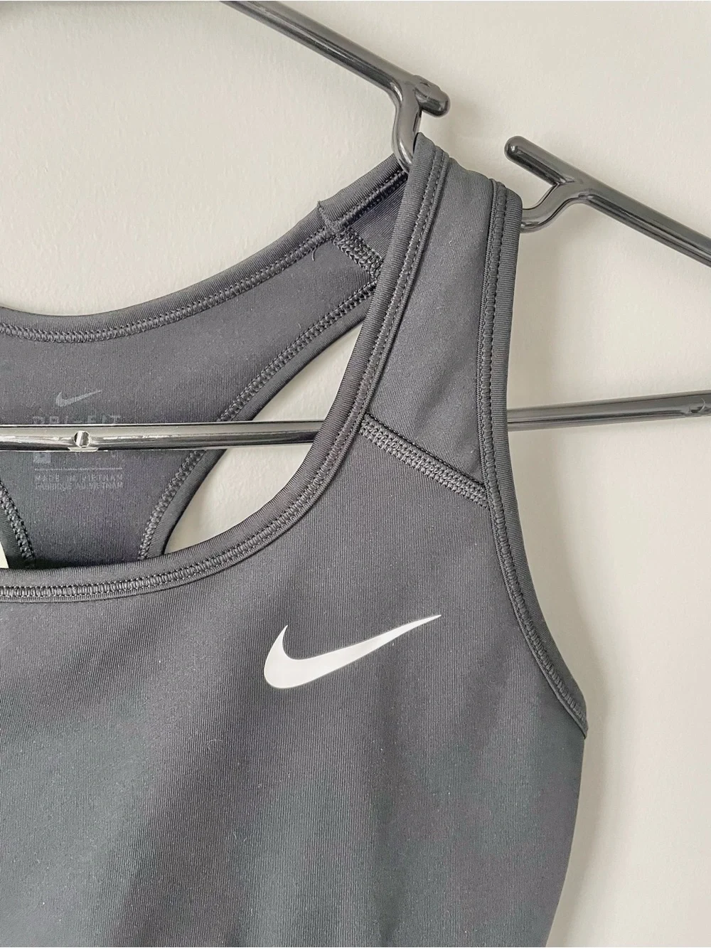 Nike Dri-FIT Black Solid Logo Racerback Wireless Pullover Sports Bra Women’s S